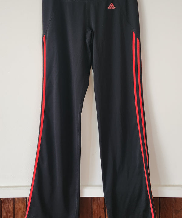 Orange and black Adidas Pants. Size Medium.