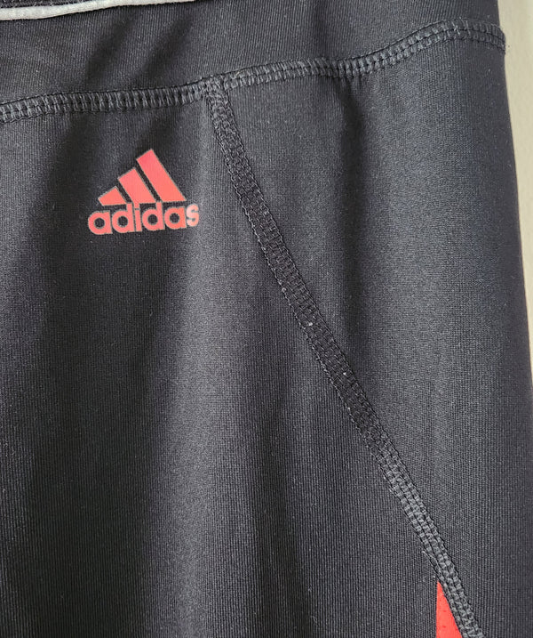 Orange and black Adidas Pants. Size Medium.